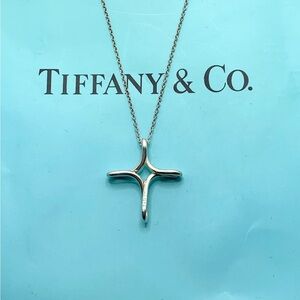 Tiffany Elsa Peretti cross pendant with chain. Comes with dust bag.
